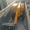Внутриреспубликанская перевозка строительного подъёмника в зерновозе